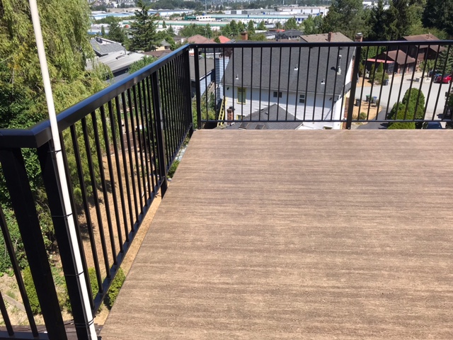 Finished vinyl deck surface with view over the valley