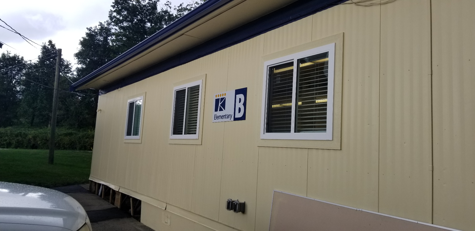 Exterior refresh with new paint, windows, and trim