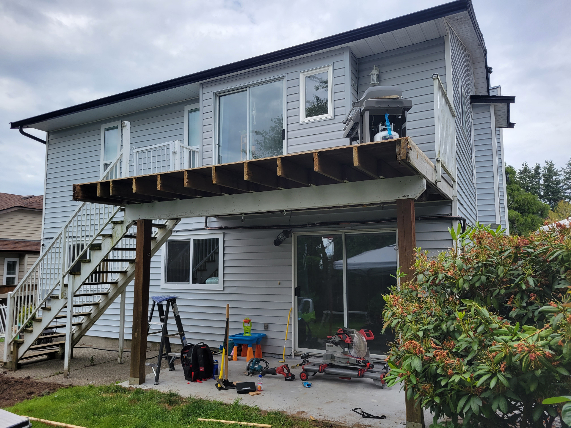 Original elevated deck with worn structure before rebuild