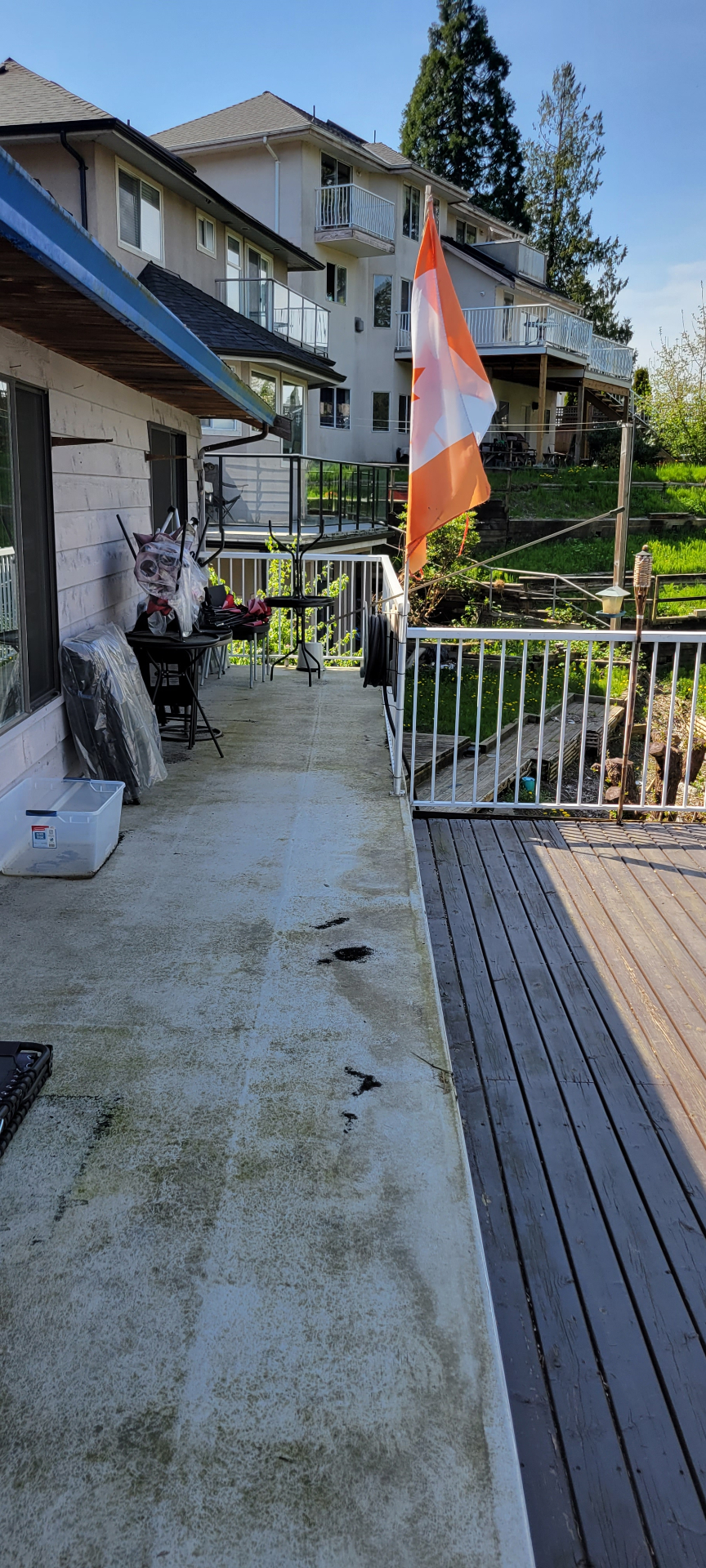 Worn deck surface and railing before rebuild
