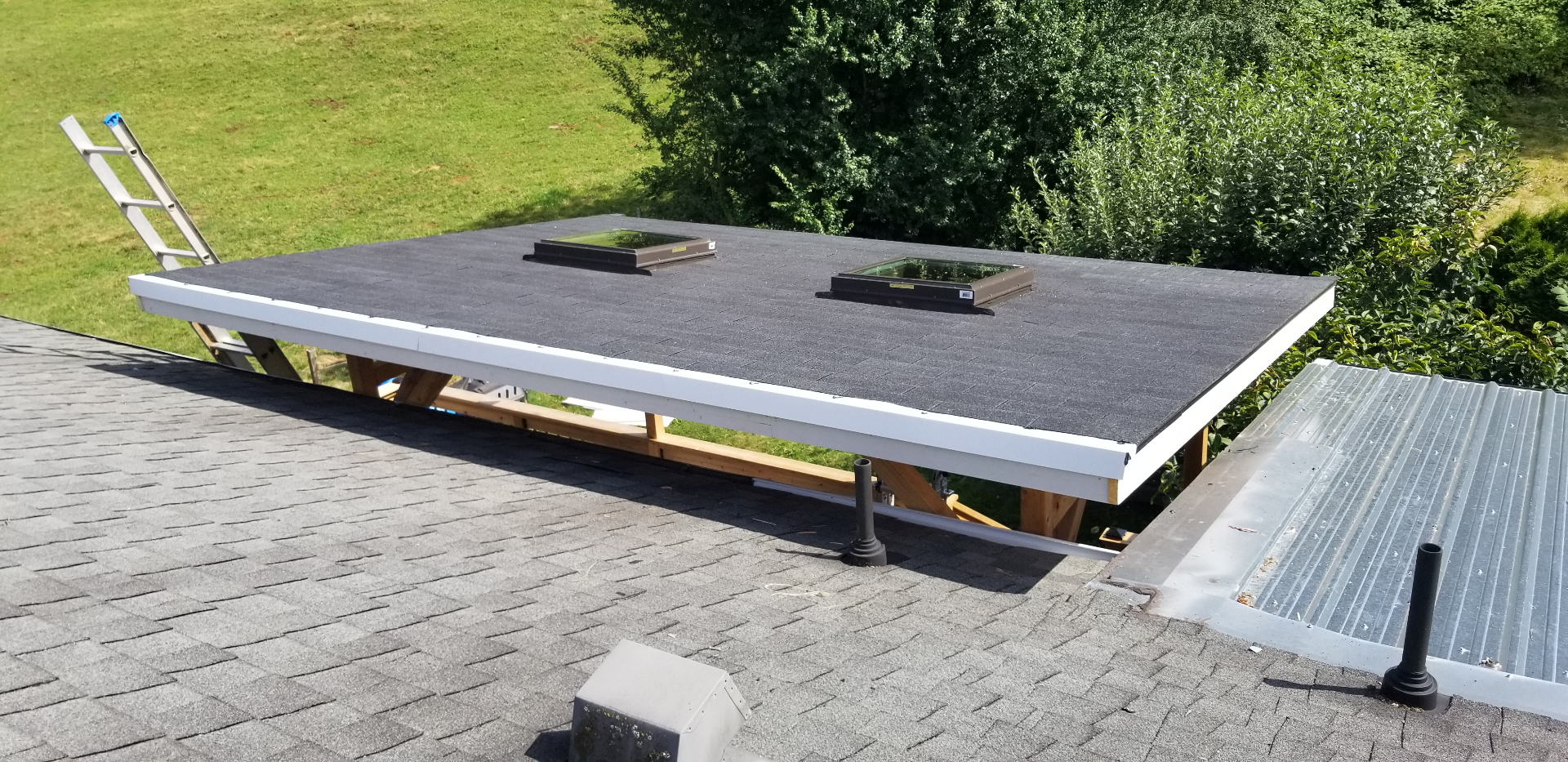 Finished pergola roof with skylights